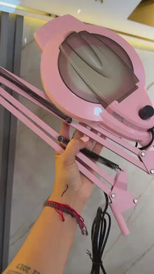 Lámpara lupa de mesa rosada